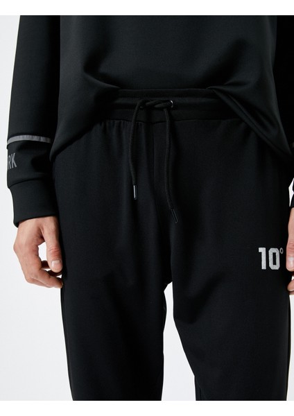 Jogger Eşofman Altı Beli Bağcıklı Slogan Baskılı Cepli indirimleri