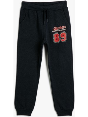 Koton Basic Jogger Eşofman Altı Spor Temalı Baskı Detaylı Beli Bağlamalı Şardonlu