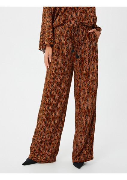 Bol Paça Pantolon Bağcıklı Yüksek Bel Püsküllü modelleri