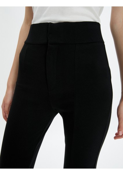 Tayt Pantolon Yırtmaç Detaylı Yüksek Belli Beli Lastikli indirimleri