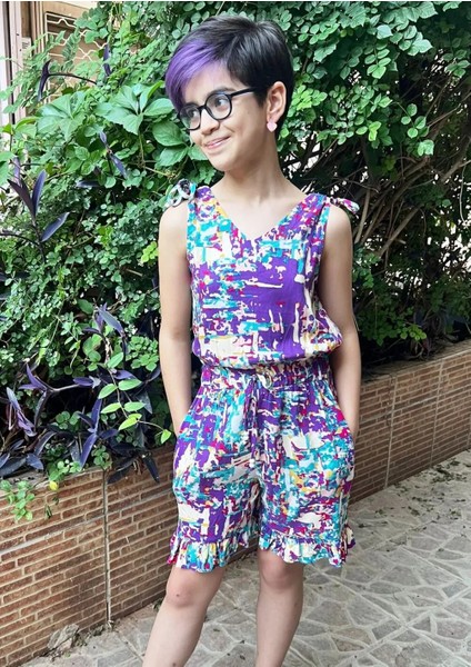 Kız Çocuk Şort Tulum Elbise – %100 Viskoz, Ayarlanabilir Boncuklu Askılı, Beli Lastikli, Paçalar Fırfırlı ve Cepli