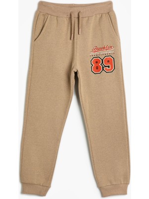 Koton  Basic Jogger Eşofman Altı Beli Bağlamalı Kahve Şardonlu Spor Temalı Baskı Detaylı