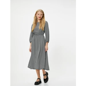 Kışlık Elbise Maksi Boy Uzun Kollu Yuvarlak Yaka Gipe Detaylı Kazayağı Desenli