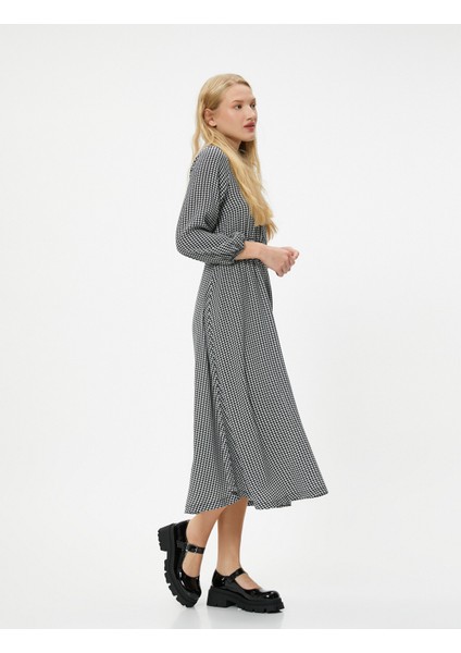 Kışlık Elbise Maksi Boy Uzun Kollu Yuvarlak Yaka Gipe Detaylı Kazayağı Desenli fiyatları