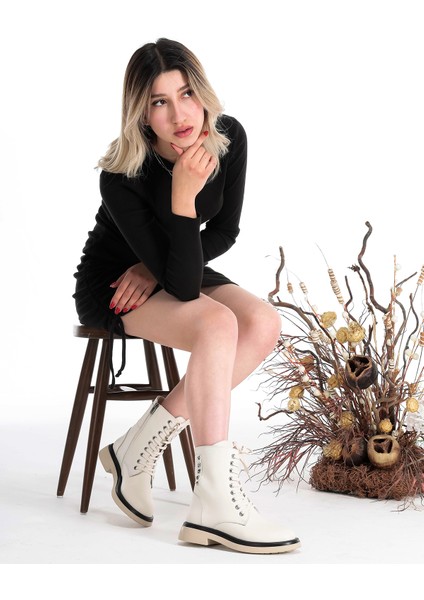 Deri Zımba Detaylı Fermuarlı Rahat Kadın Bot Ayakkabı fırsatları