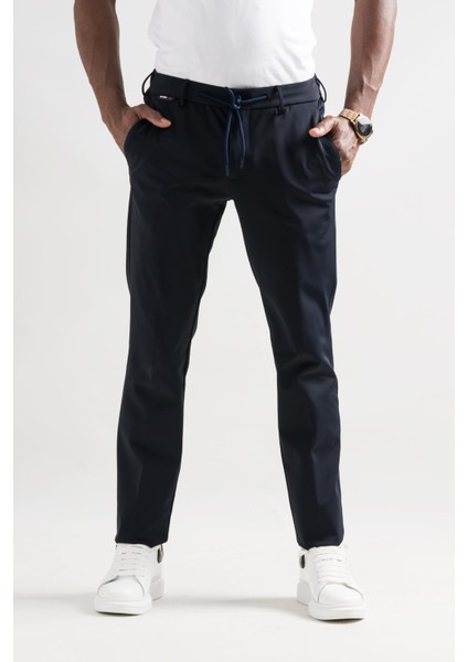 Slimfit Beli Lastikli ve Iplikli Polyamid Hafif Parlak Kışlık Kumaş Erkek Jogger Pantolon