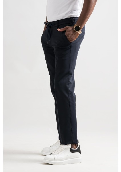 Slimfit Beli Lastikli ve Iplikli Polyamid Hafif Parlak Kışlık Kumaş Erkek Jogger Pantolon