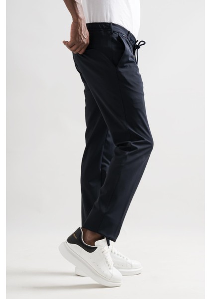 Slimfit Beli Lastikli ve Iplikli Polyamid Hafif Parlak Kışlık Kumaş Erkek Jogger Pantolon