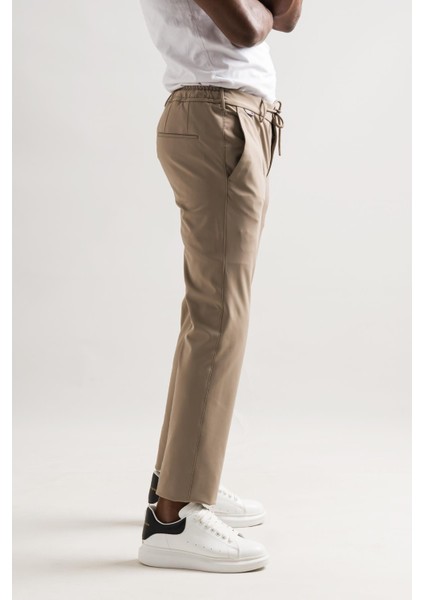 Slimfit Beli Lastikli ve Iplikli Polyamid Hafif Parlak Kışlık Kumaş Erkek Jogger Pantolon
