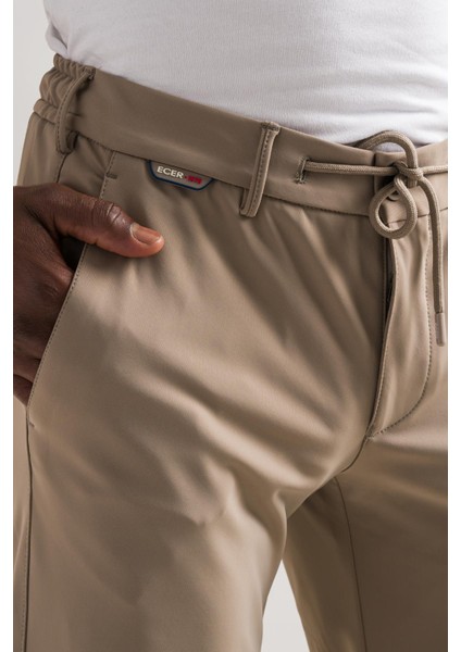 Slimfit Beli Lastikli ve Iplikli Polyamid Hafif Parlak Kışlık Kumaş Erkek Jogger Pantolon