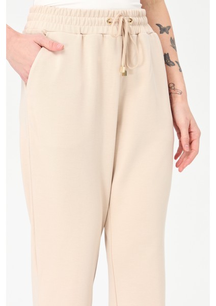 Kadın Paça Arkası Lastikli Cepli Eşofman Pantolon Bej modelleri