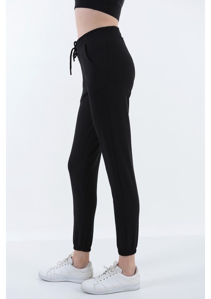 Kadın Yüksek Bel Cepli Bel Paça Lastikli Dalgıç Kumaş Şardonlu Eşofman Altı fiyatları