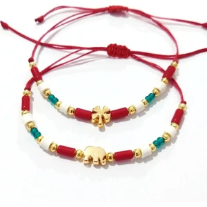 Funny Takı Iki Adet Kırmızı Beyaz Boncuklu Yonca ve Fil Yılbaşı Bileklik