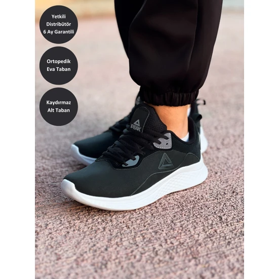 Peak P-Motive Kadın Siyah Beyaz Kaymaz Taban Ortopedik Nefes Alabilen Garantili Rahat Hafif Günlük Sneaker Yürüyüş Koşu Spor Ayakkabısı E14218H