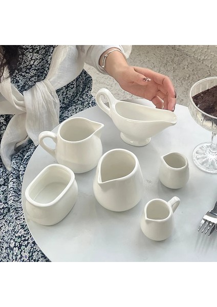 1 Adet Yaratıcı Saf Beyaz Seramik Kahve Küçük Süt Kupası Pot Pot Biftek Sos Kulplu Fincan Boyutu Şeker Kavanozu Süt Kaşığı Gaga Bardak (Yurt Dışından) fiyatları