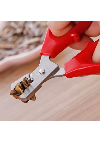 Resim Olarak Ev Kırmızı Fıstık Kabuğu Açacağı Paslanmaz Çelik Fındık Kraker Kavun Tohumları Pense Çam Fıstığı Soyma Aracı Gadget (Yurt Dışından) fiyatları