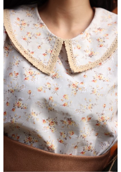 Vintage Krem-Kahve Çiçekli Bebe Yaka Dantelli Poplin Bluz fırsatları