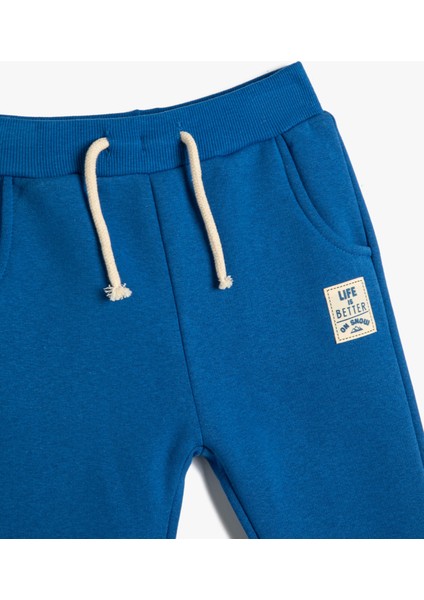 Jogger Eşofman Altı Aplike Detaylı Beli Bağlamalı Şardonlu modelleri