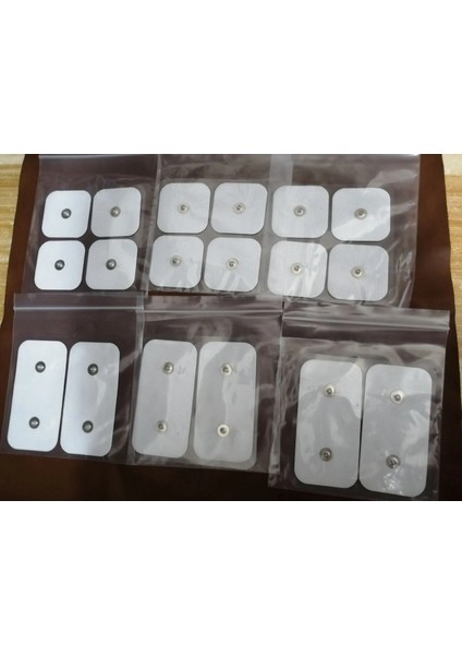 18 Adet 5x5 cm 5X10 cm Kendinden Yapışkanlı Elektrot Pedi Elektrotlar Onlarca Compex Elektrik Stimülatörü Çift Geçmeli Elektrotlar (Yurt Dışından) fiyatları