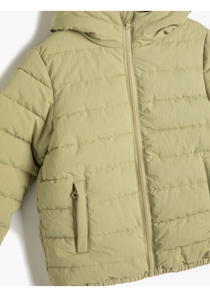 Şişme Mont Kapşonlu Içi Polar Astarlı Cepli Etiket Detaylı