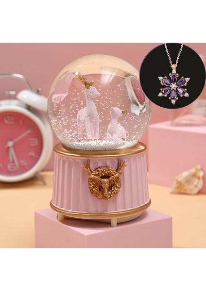 Pembe-Geyikli Orta Boy Işıklı Müzikli Kar Küresi ve Lotus Çiçeği Kolye