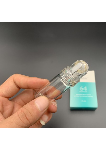 1mm 64 Pin Rulo Mikro Titanyum Iğne Uçları Derma Iğneleri Cilt Bakımı Anti-Aging Beyazlatıcı Şişe Rulo Serum Yeniden Kullanılabilir (Yurt Dışından) fiyatları
