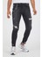 Erkek Slim Fit Likralı Yırtık Füme Kot Pantolon 1