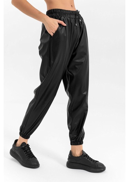 Kadın Siyah Beli Ve Paçası Lastikli Deri Pantolon fiyatları