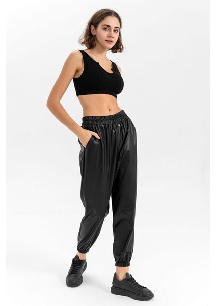 Kadın Siyah Beli Ve Paçası Lastikli Deri Pantolon modelleri
