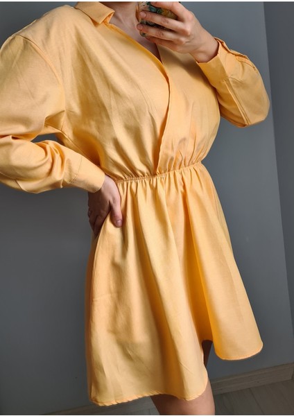 Cepli Beli Lastikli Kruvaze Yaka Elbise indirimleri