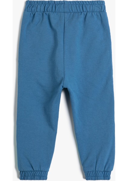 Jogger Eşofman Altı Beli Bağlamalı Canavar Baskılı Aplike Detaylı Pamuklu fiyatları