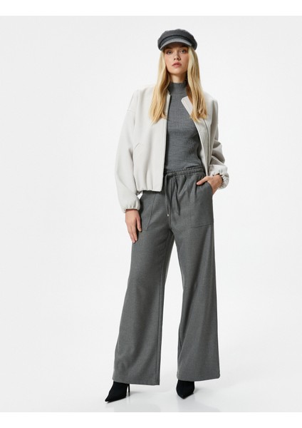 Şahika Ercümen x Koton - Beli Bağcıklı Bol Paça Pantolon fiyatları