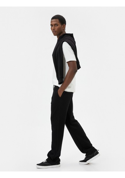 Oversize Eşofman Altı Beli Bağcıklı Bol Paça Cep Detaylı fiyatları