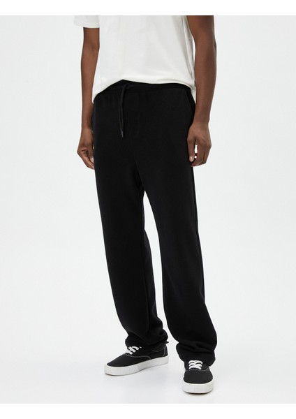 Oversize Eşofman Altı Beli Bağcıklı Bol Paça Cep Detaylı modelleri