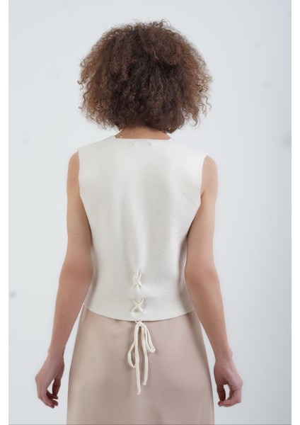 Ekru Triko Yelek fırsatları