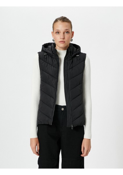 Kısa Şişme Yelek Kapüşonlu Fermuarlı Cep Detaylı modelleri