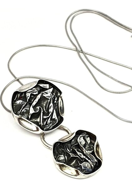 Tasarım el işi gümüş kolye