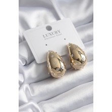 Clariss Pirinç Gold Renk Zirkon Taşlı Damla Model Kadın Küpe