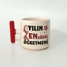 Mor Mürekkep Yılın En Güzel Öğretmeni Baskılı Kırmızı Kulplu T Öğretmenler Günü Kupa