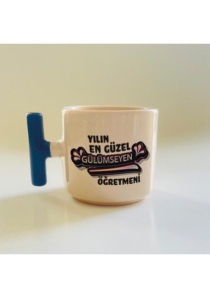 Yılın En Güzel Gülümseyen Öğretmeni Baskılı Mavi Kulplu T Öğretmenler Günü Kupa