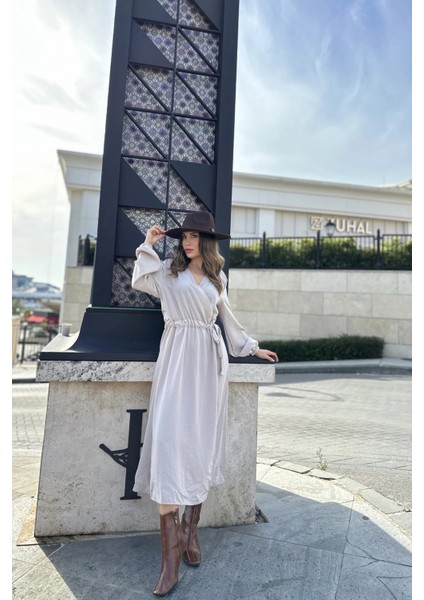 Kadın Bej Kruvaze Yaka, Yırtmaçlı, Beli Kuşaklı, Kol Bilekleri Lastikli, Salaş, Uzun Elbise modelleri