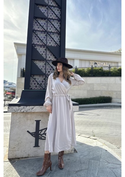 Kadın Bej Kruvaze Yaka, Yırtmaçlı, Beli Kuşaklı, Kol Bilekleri Lastikli, Salaş, Uzun Elbise fırsatları