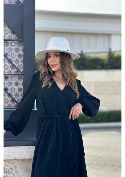 Kadın Siyah Kruvaze Yaka, Yırtmaçlı, Beli Kuşaklı, Kol Bilekleri Lastikli, Salaş, Uzun Elbise fiyatları