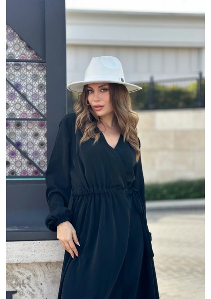 Kadın Siyah Kruvaze Yaka, Yırtmaçlı, Beli Kuşaklı, Kol Bilekleri Lastikli, Salaş, Uzun Elbise modelleri