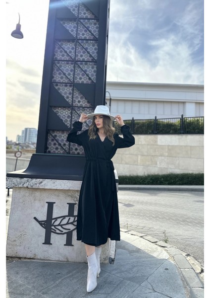 Kadın Siyah Kruvaze Yaka, Yırtmaçlı, Beli Kuşaklı, Kol Bilekleri Lastikli, Salaş, Uzun Elbise indirimleri