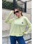 Kadın Fıstık Yeşil Uzun Kol, Yırtmaç Detaylı, Arma ve Yazı Detaylı, Kapüşonlu Sweatshirt Bluz 4