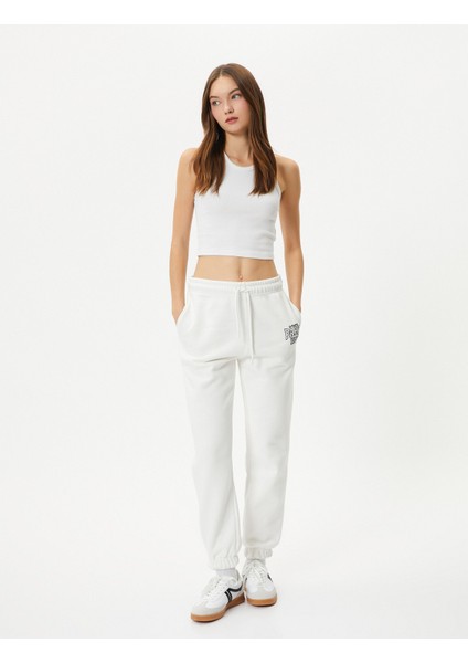 Jogger Eşofman Altı Beli Bağlamalı Cepli Baskı Detaylı fiyatları