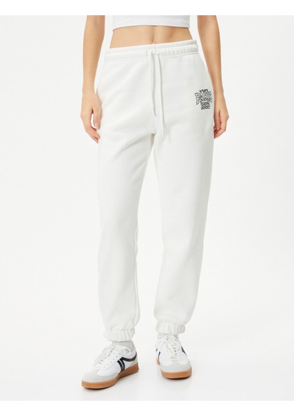 Jogger Eşofman Altı Beli Bağlamalı Cepli Baskı Detaylı modelleri