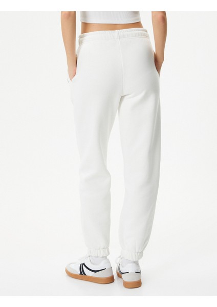 Jogger Eşofman Altı Beli Bağlamalı Cepli Baskı Detaylı fırsatları