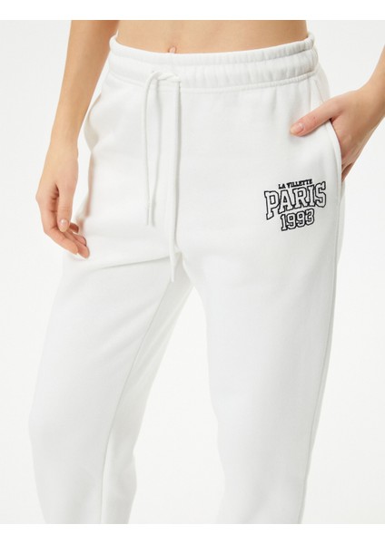 Jogger Eşofman Altı Beli Bağlamalı Cepli Baskı Detaylı indirimleri